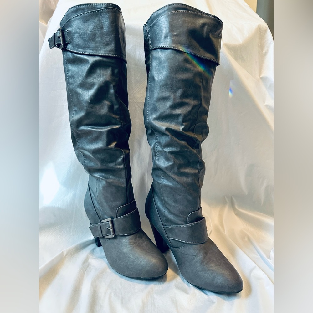 Knee high heeled boots